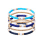 GOOJIDS Surfer Heishi Clay Bead Bracelets for Women Bohemian Stackable Gold Plated Beaded Stretch Bracelets Elastic Layering Friendship Bracelets Set Boho Jewelry