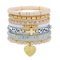 GOOJIDS Surfer Heishi Clay Bead Bracelets for Women Bohemian Stackable Gold Plated Beaded Stretch Bracelets Elastic Layering Friendship Bracelets Set Boho Jewelry