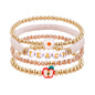 GOOJIDS Surfer Heishi Clay Bead Bracelets for Women Bohemian Stackable Gold Plated Beaded Stretch Bracelets Elastic Layering Friendship Bracelets Set Boho Jewelry
